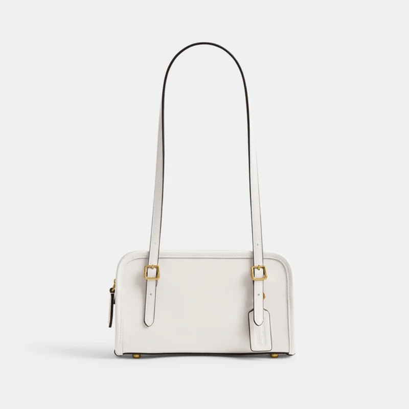 Bolsa Coach Swing Zip 20 – Elegância Compacta com Estilo Retrô